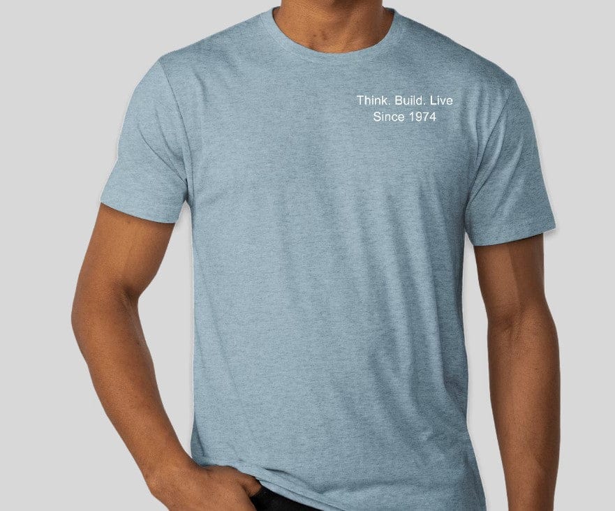 Sport the Custom Ink 50th Anniversary Adult T-Shirt in light blue, featuring "Think. Build. Live Since 1974" on the upper left chest, combining Next Level Tri-Blend comfort with a nod to half a century of building knowledge.