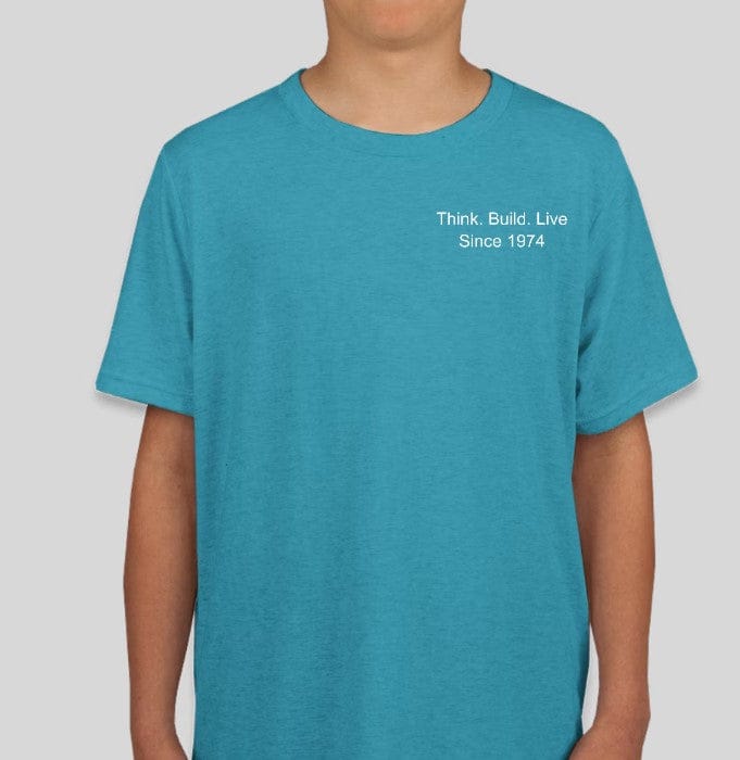 Someone wearing a Custom Ink 50th Anniversary Youth T-shirt celebrates in style, featuring "Think. Build. Live Since 1974" on a turquoise design, and enjoying Next Level Tri-Blend comfort.