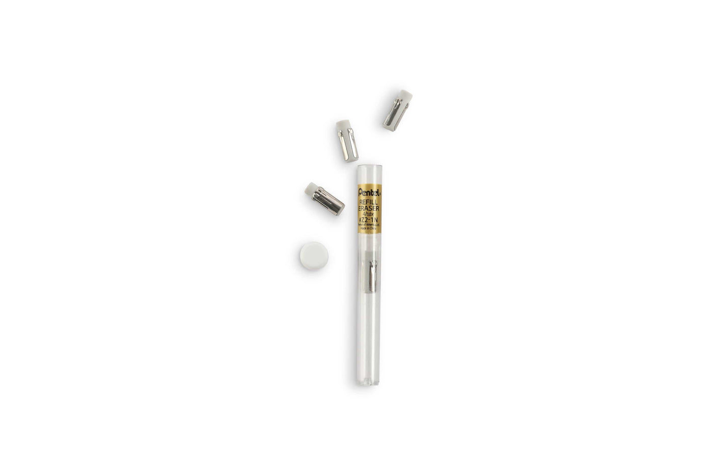 A GraphGear 500 Mechanical Pencil by Dick Blick, featuring a clear design with gold accents, sits on a white background beside four small white cylindrical objects, capturing the essence of precise writing.