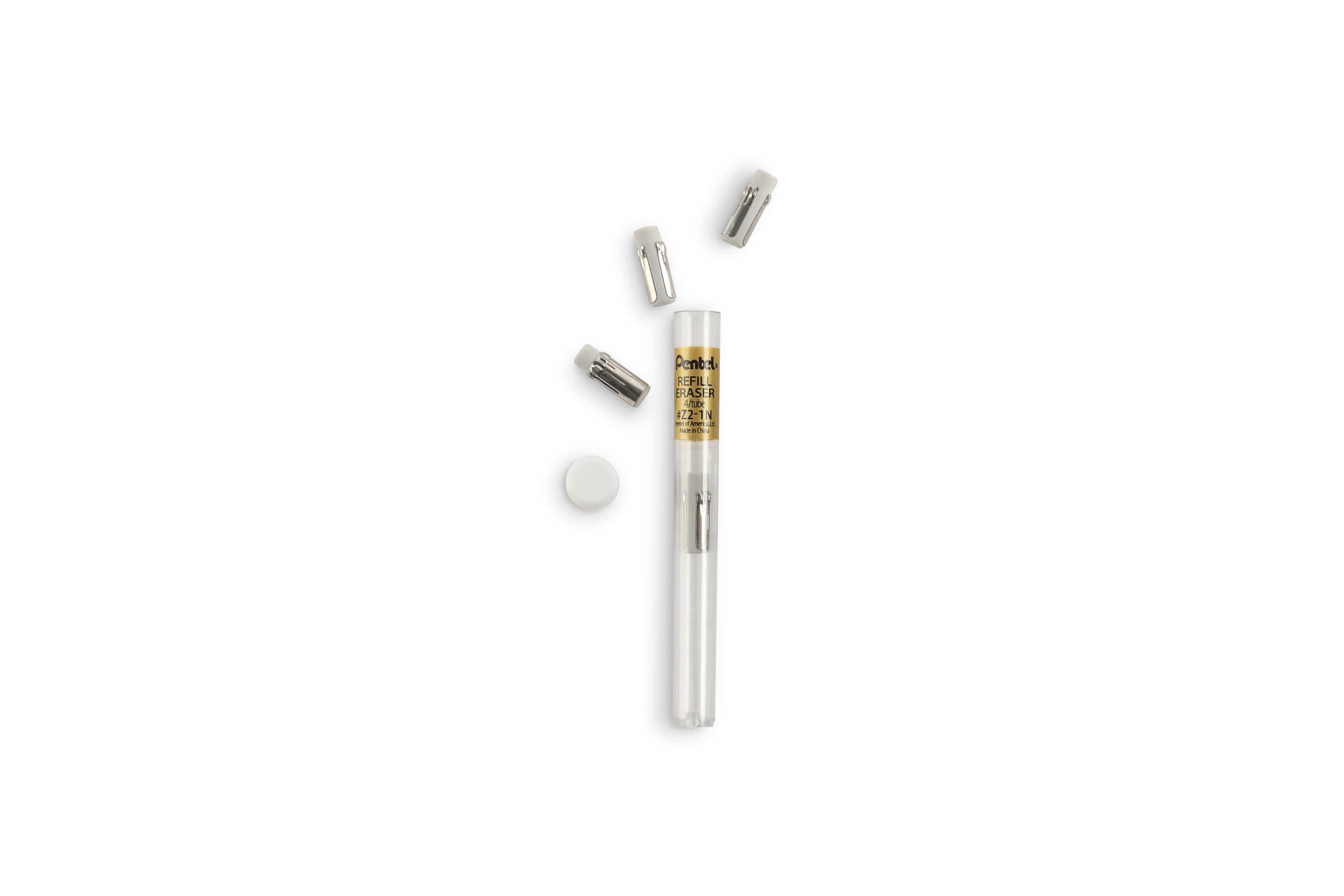 A GraphGear 500 Mechanical Pencil by Dick Blick, featuring a clear design with gold accents, sits on a white background beside four small white cylindrical objects, capturing the essence of precise writing.