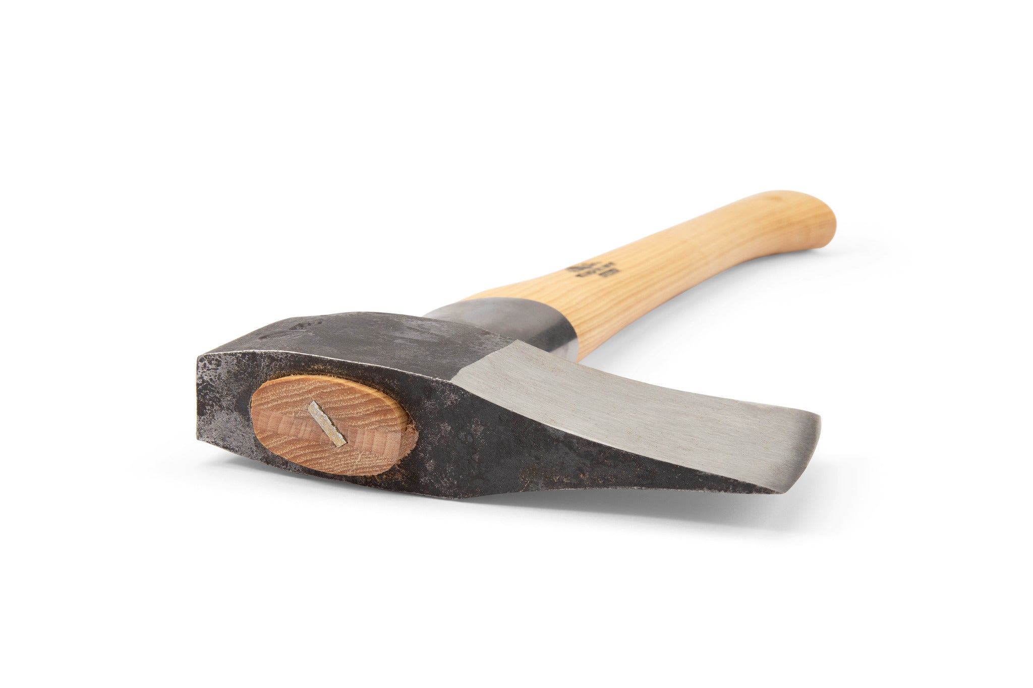 A GRF Gransfors Bruk Splitting Hatchet 439 with a wooden handle rests sideways, highlighting its hand-forged steel head—ideal for splitting firewood—against a simple white background.