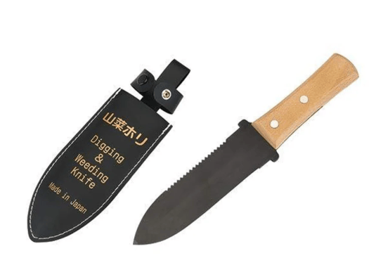 The Gyokucho Hori Hori Garden Digging Tool features a serrated black blade, light wooden handle, and comes with a labeled black sheath—perfect for digging, weeding, or planting bulbs.