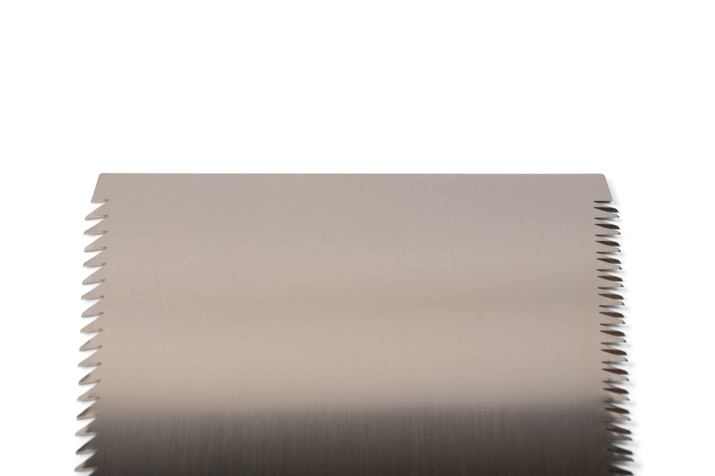 Close-up of a Gyokucho Ryoba Japanese Handsaw, featuring fine, evenly spaced serrated teeth along the blade edges, isolated on a white background.