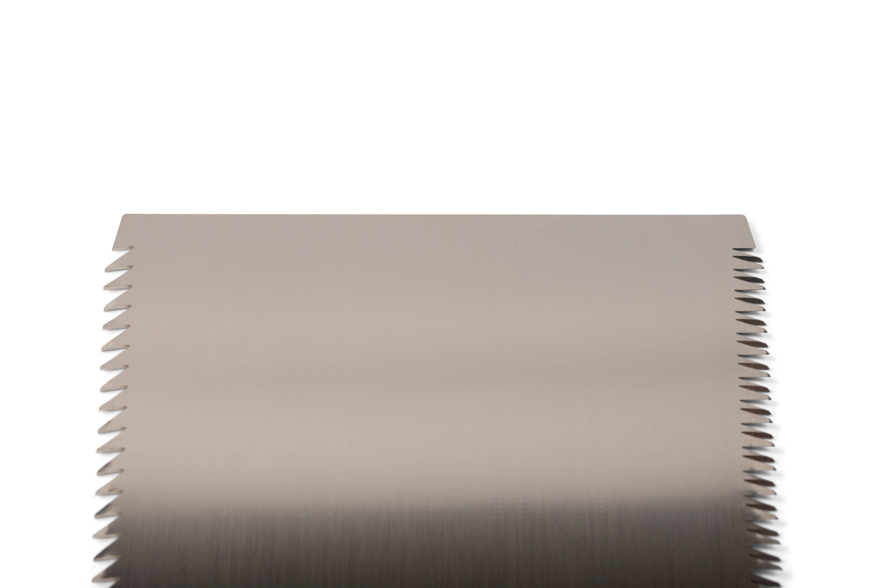 Close-up of a Gyokucho Ryoba Japanese Handsaw, featuring fine, evenly spaced serrated teeth along the blade edges, isolated on a white background.