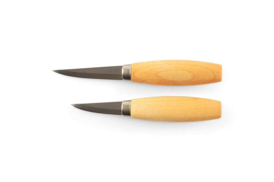 Two Mora Wood Carving Knives with wood handles and short blades, made from durable laminated steel, lie parallel on a white background—precision tools perfect for any Industrial Revolution carving enthusiast.