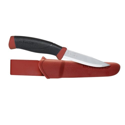 The Companion Adventure Knife by Mora from Industrial Revolution is an outdoor knife featuring a durable stainless steel blade, ergonomic black handle, and a red sheath.