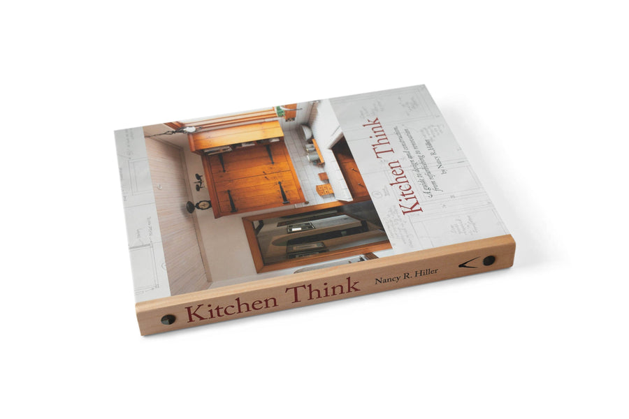 Kitchen Think: A Guide to Design and Construction, From Refurbishing to Renovation by LAP—an essential read for kitchen design inspiration and remodeling ideas—features a cover with wooden cabinets on a white surface.