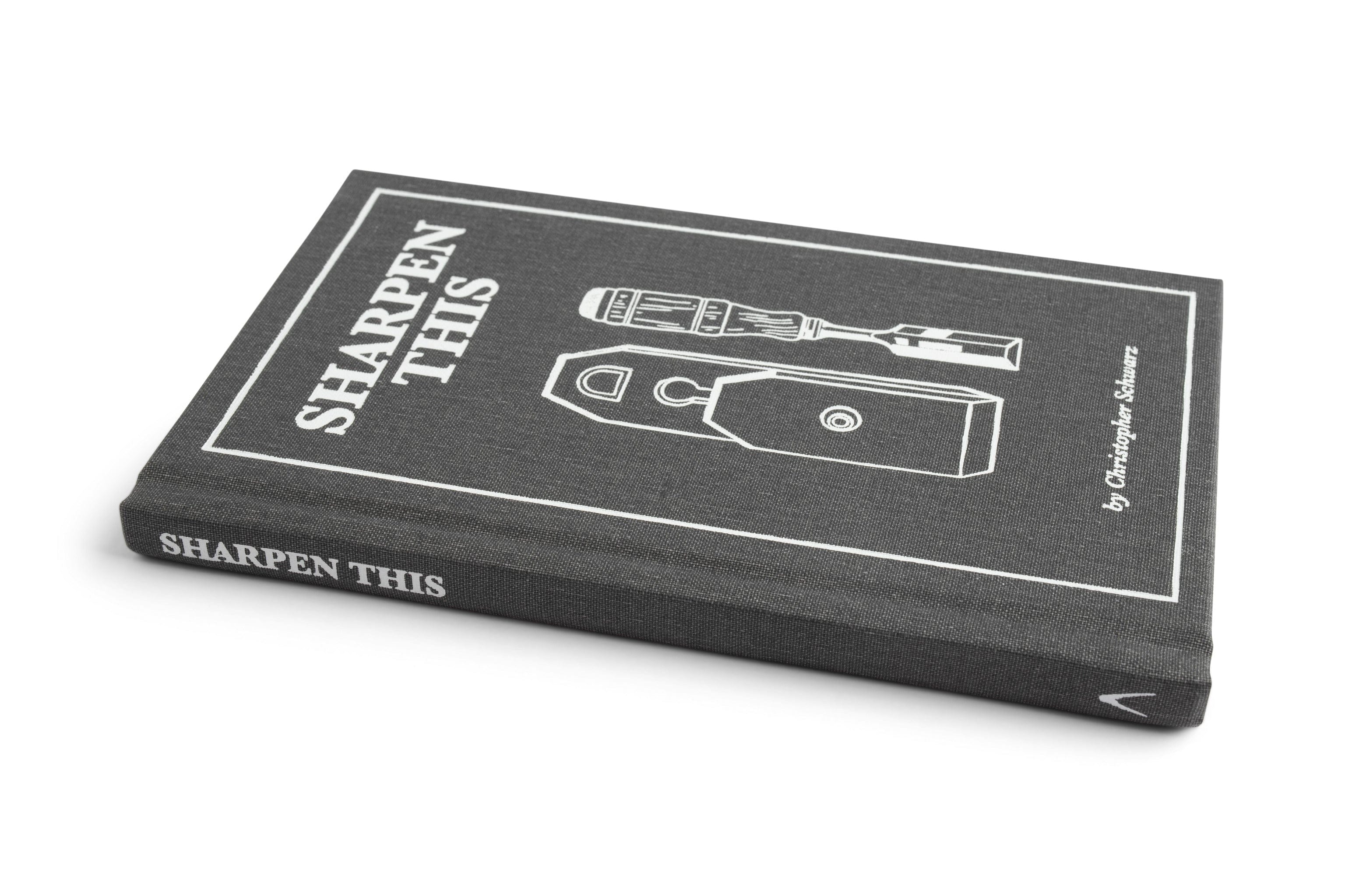 Sharpen This, a hardcover book by LAP, provides practical sharpening advice to improve your woodworking results. The black cover features white line illustrations of tools.