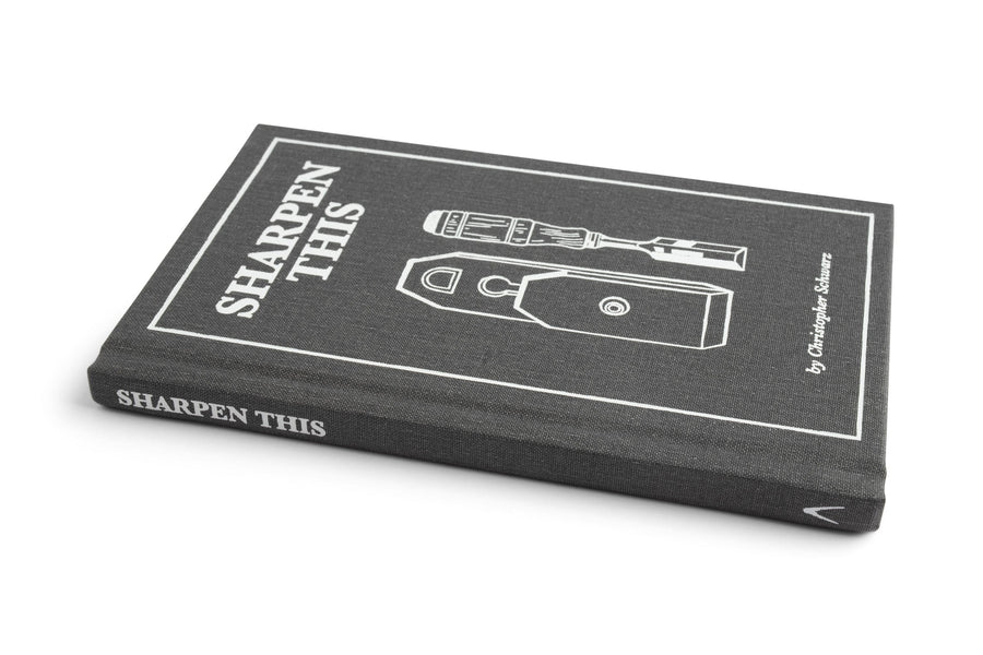 Sharpen This, a hardcover book by LAP, provides practical sharpening advice to improve your woodworking results. The black cover features white line illustrations of tools.