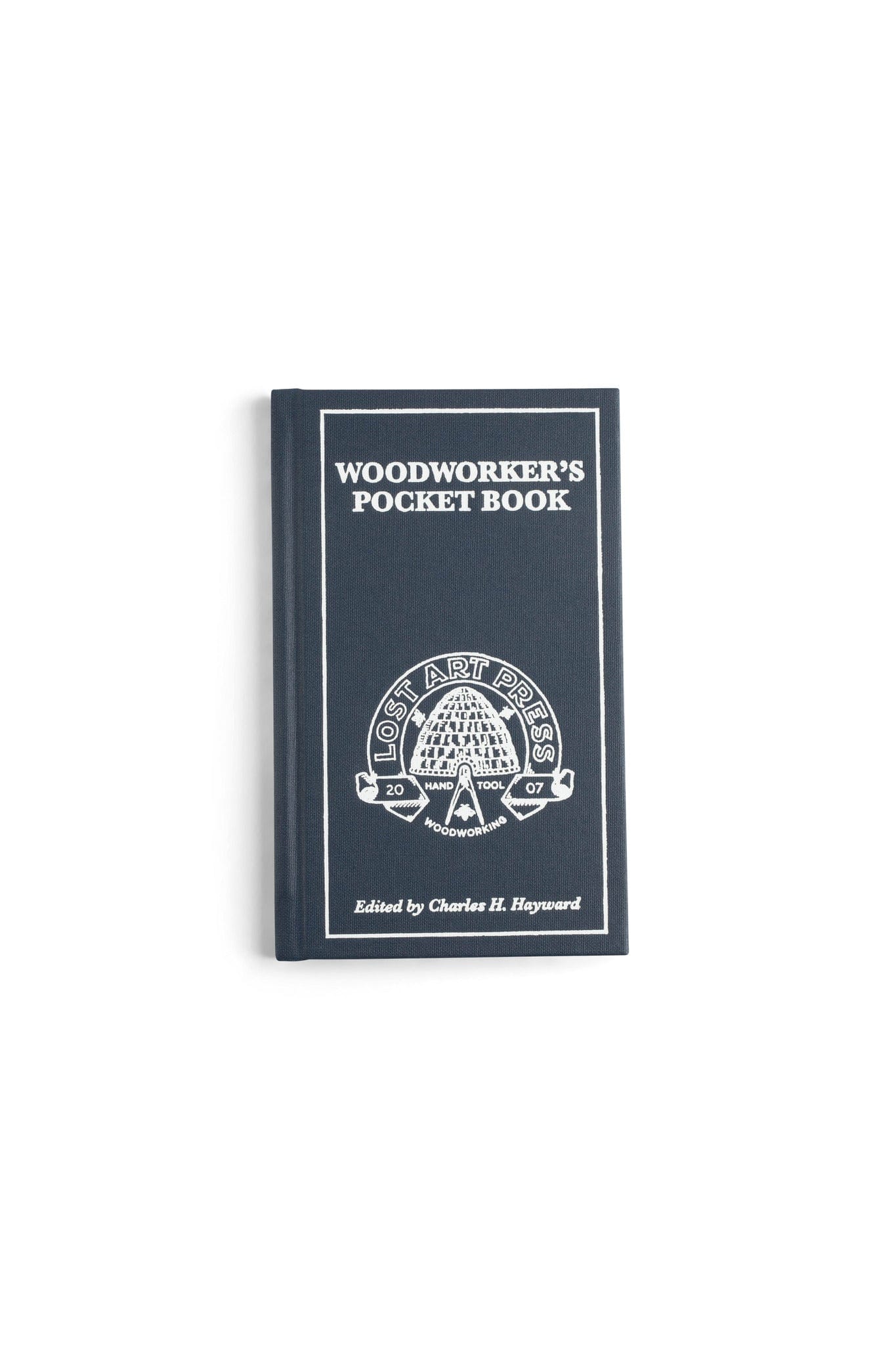 The Woodworker’s Pocket Book by LAP is a dark blue hardcover with white illustration and text—an essential resource for hand-tool woodworking enthusiasts.
