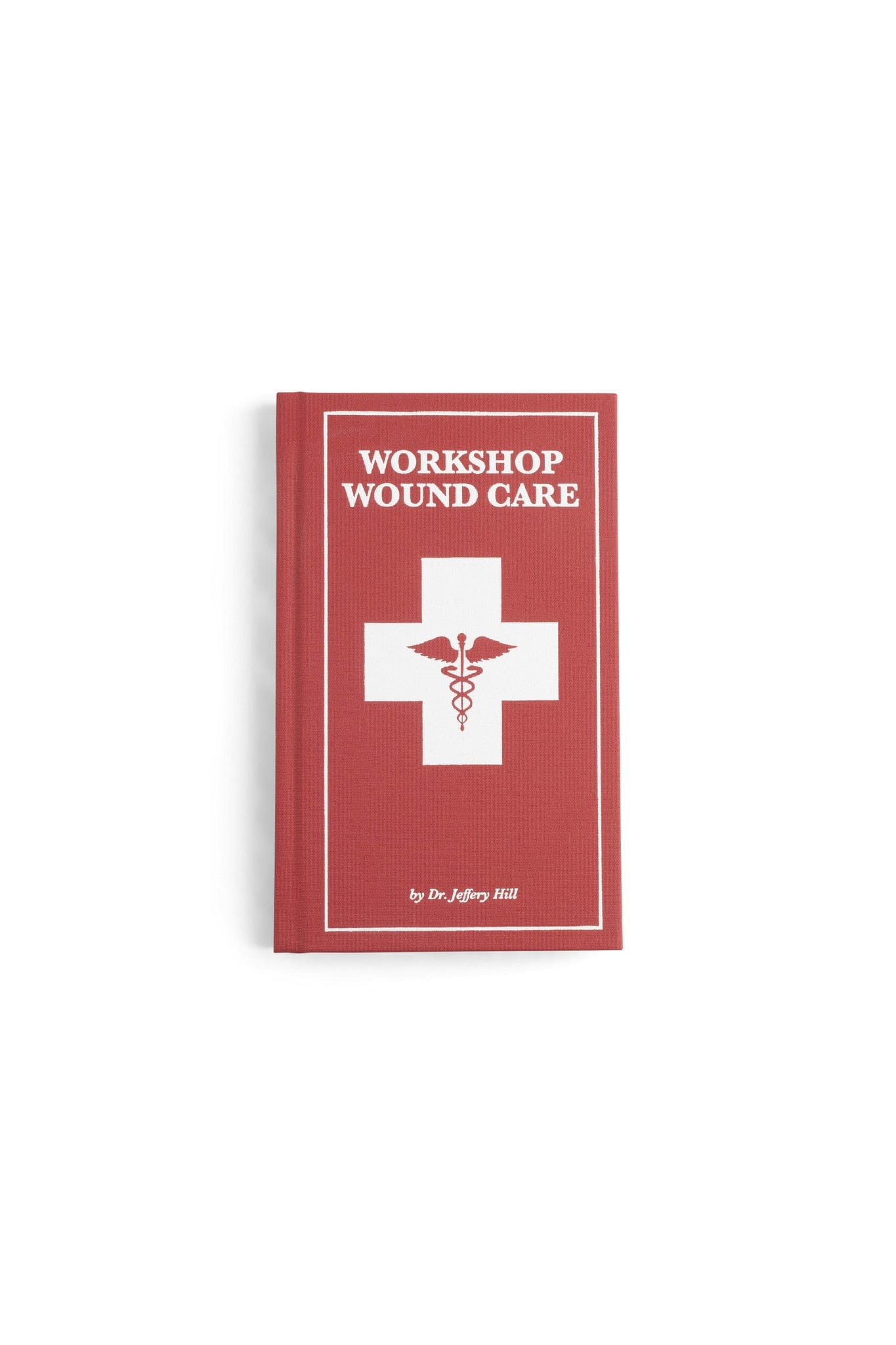 Workshop Wound Care by LAP is a red book that provides first aid advice and treatment guidance for woodworking injuries.