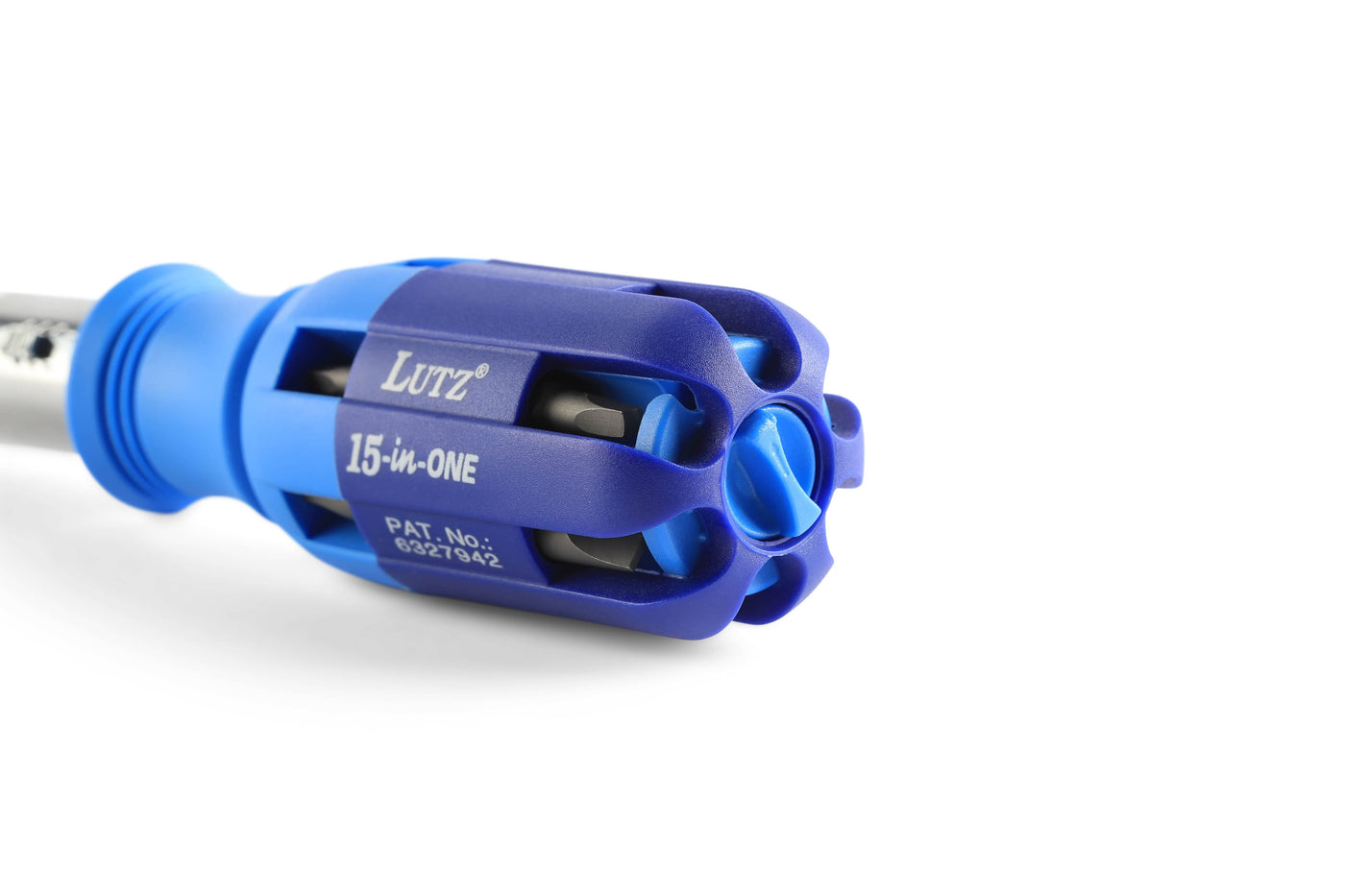 Close-up of a blue LUT tool labeled 15-W-ONE, with visible patent number. This Shelter Tools Lutz Screwdriver features a 15-in-1 design, cylindrical handle, metal rod extension, and reliable ratcheting for easy use.