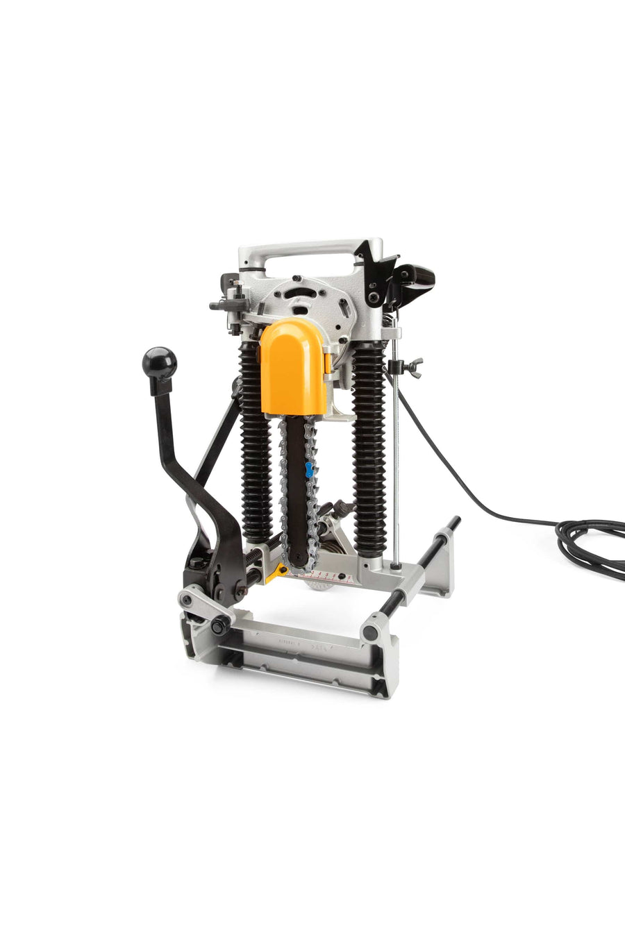 The Makita 7104L Chain Mortiser by Makita, featuring metal and plastic construction with a yellow safety cover, black handle, exposed springs, and an electric cord, is ideal for log home building or timber framing. It stands upright on a white background.