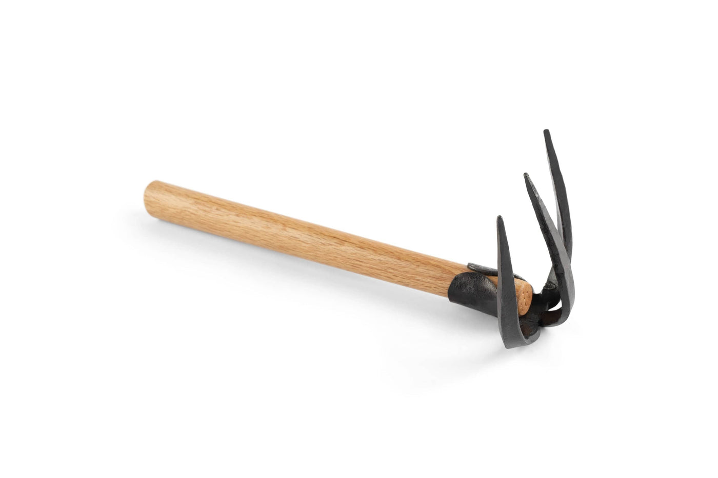 A MARU Japanese Bear Claw Gardening Tool, with a wooden handle and a high carbon steel head featuring three prongs, rests on a pristine white background.