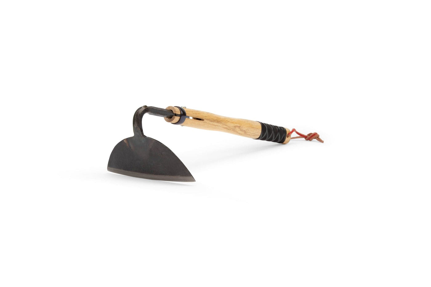 The MARU Japanese Grass Cutter features a wooden handle with a leather strap and a sharpened blade, making this practical kneeling garden tool easy to use and store. Shown resting on a white background.