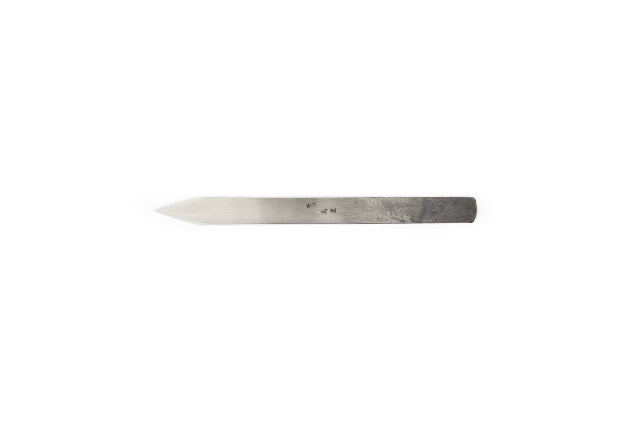 The MARU Japanese Kensaki Marking Knife, shown on a white background, features a flat metal blade with one pointed and one blunt end. Its aged, tarnished surface displays the patina typical of a well-used marking tool.