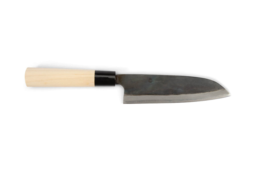 The MARU Japanese Santoku Chef Knife features a handmade, wide rectangular blade and a light wood handle, displayed on a plain white background.