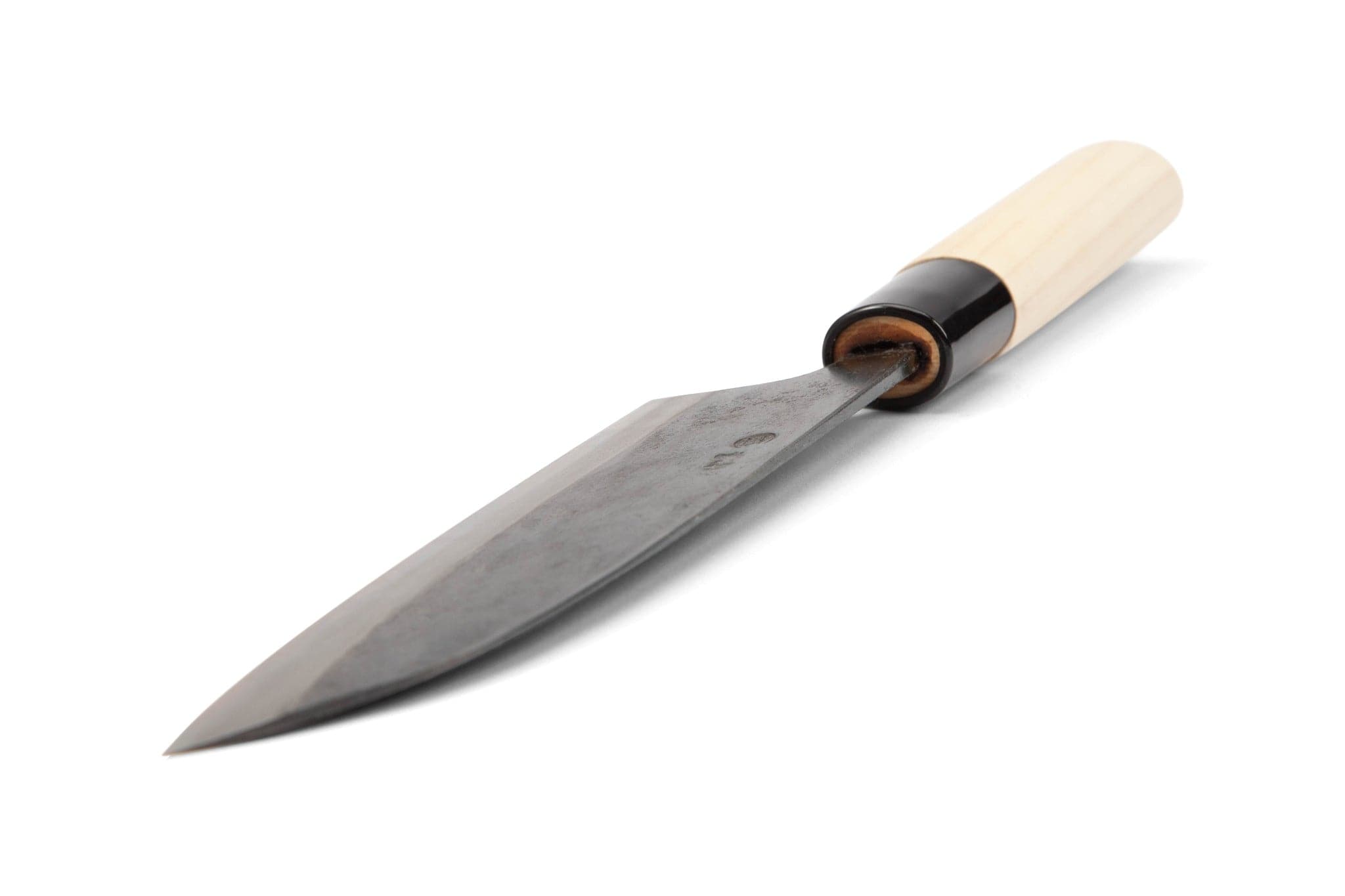 The MARU Japanese Santoku Chef Knife features a dark, wide damask steel blade and a light wooden handle, highlighting exquisite handmade craftsmanship as it rests on a white surface.