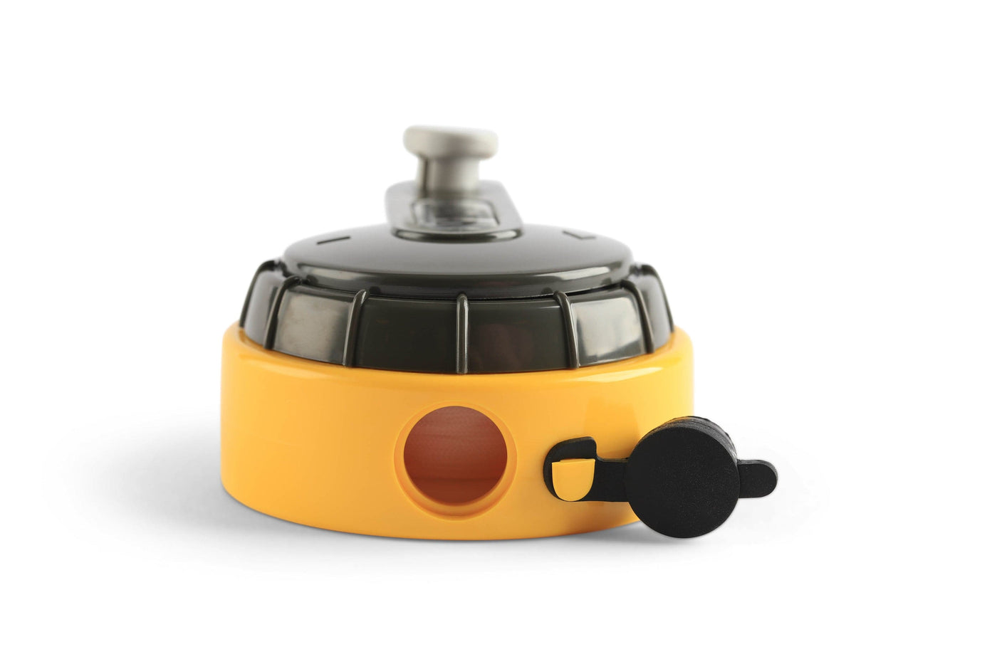 The MARU Takumi Japanese Speedy Pocket Chalkline is a yellow and black camping gas stove top with a durable resin body, featuring a side control knob and a top locking mechanism.
