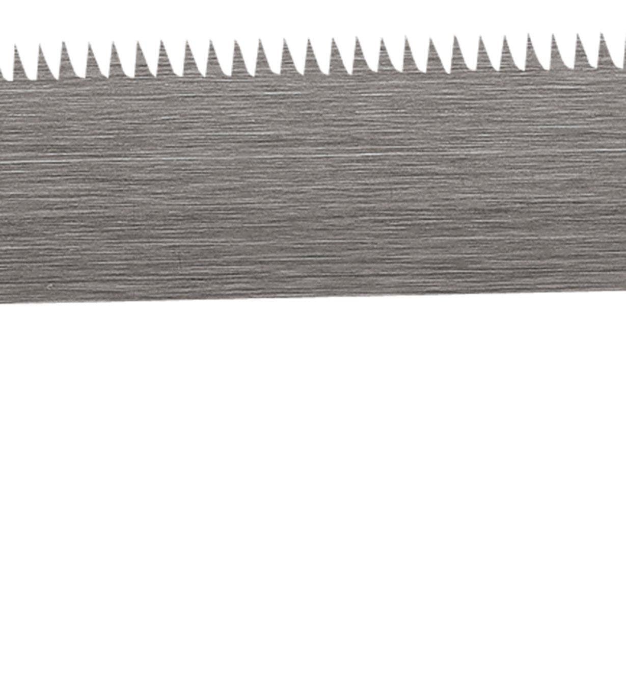 Close-up of the MARU DOZUKI 120MM WOOD HANDLE saw blade highlights its sharp, evenly spaced ripping teeth. Made in Japan, this precision tool exudes unparalleled craftsmanship.