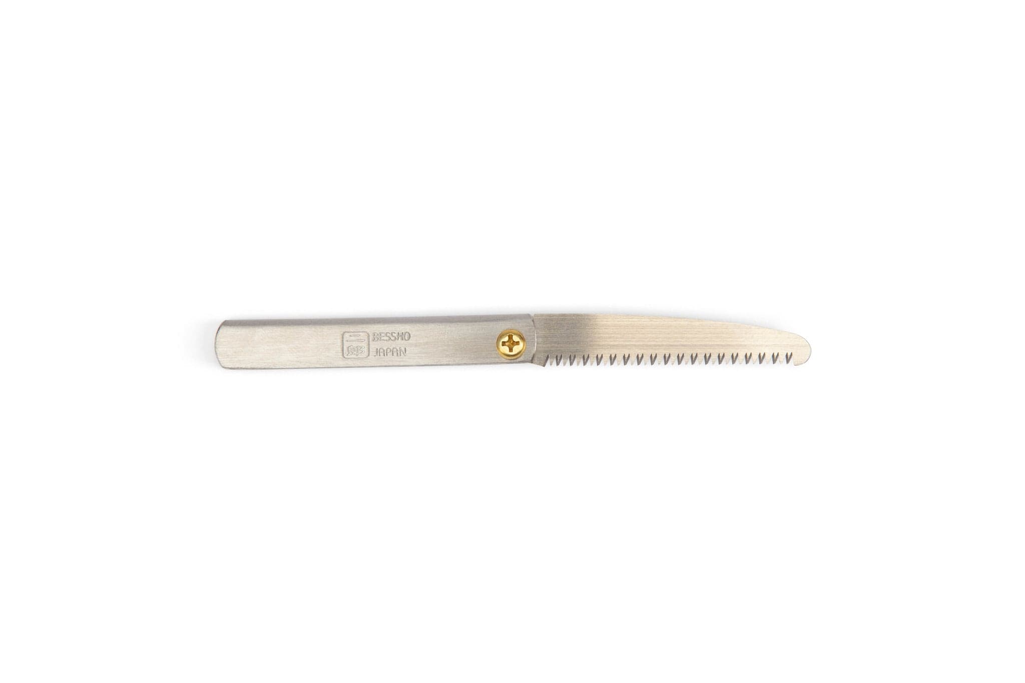 The MARU Miniature Japanese Folding Saw features a short handle, straight-edged jagged blade, metal body, brass pivot screw, and engraved handle—ideal for ultralight backpacking.