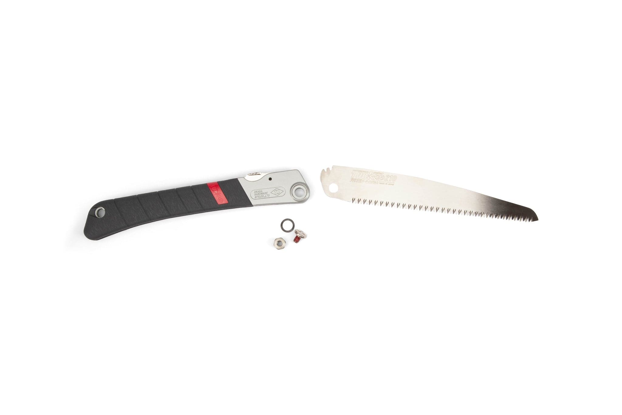 The Z-Saw Tuck-In 210 by MARU is shown on a white background, featuring a black folding handle, a separate serrated pruning saw blade, and small metal parts such as a screw, nut, and washer.