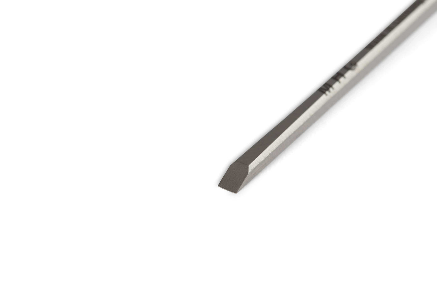 A close-up of the MHG Firmer Bench Chisel by MHG, featuring a precision beveled tip on a white background—an essential tool for fine woodworking.