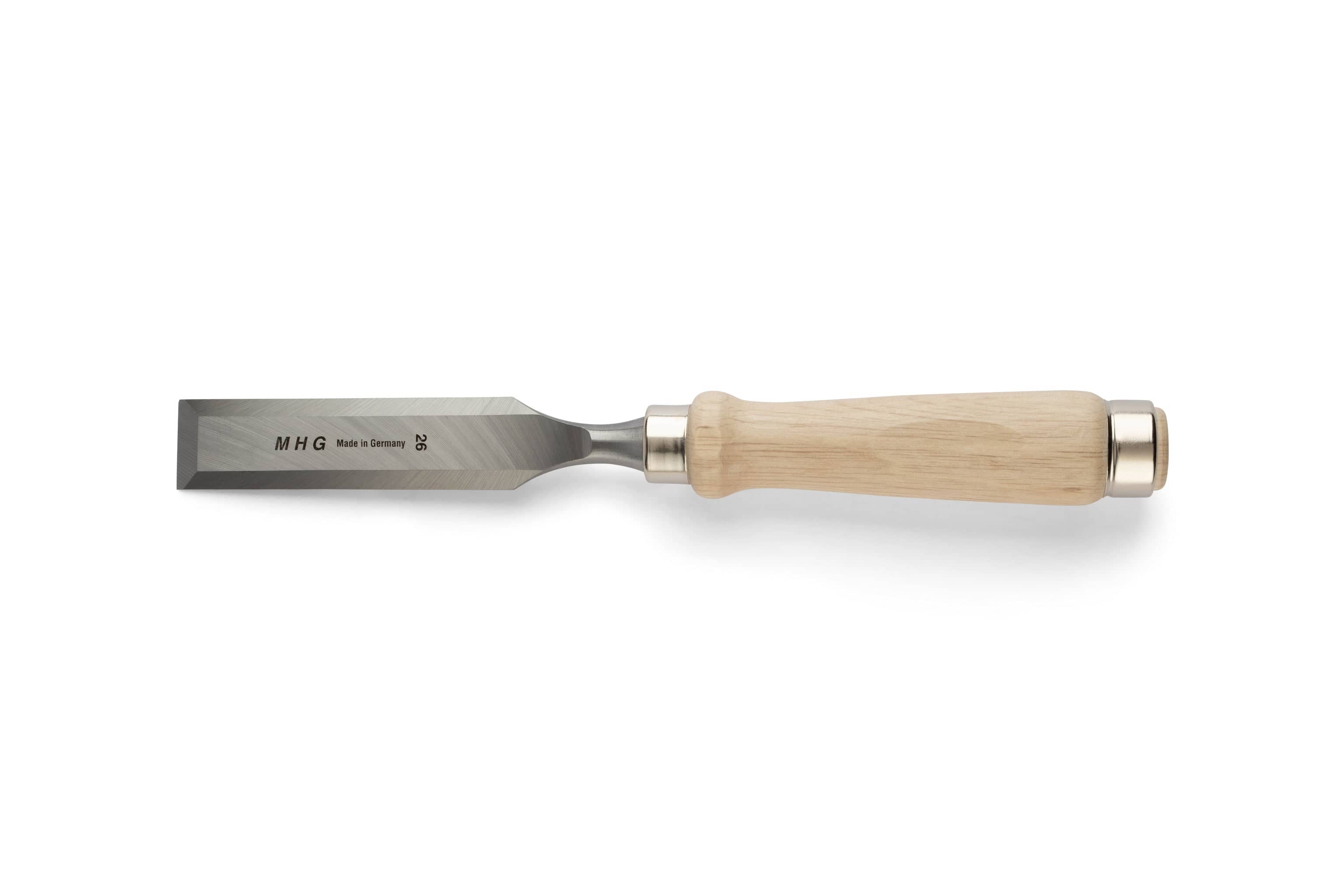 The MHG Firmer Bench Chisel features a beveled edge and light wooden handle, displaying the MHG brand. Made in Germany, it’s ideal for fine woodworking—an essential quality tool shown on a white background.