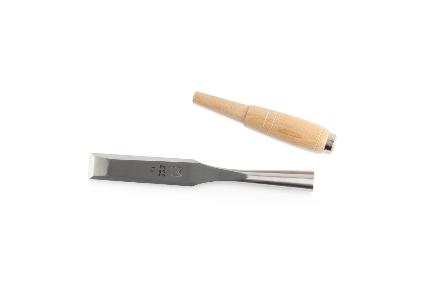 The MHG Messerschmidt Timber Framing Chisel, featuring a bevelled design with a wooden handle and metal blade angled slightly upwards against a plain white background, epitomizes the precision of professional woodworkers tools.