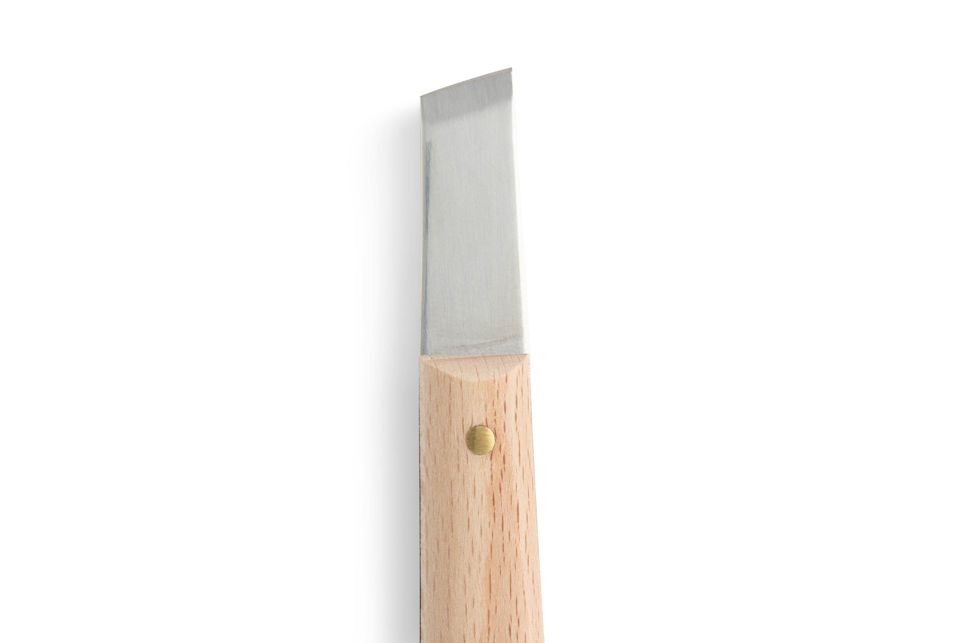 A close-up of the MHG Wood Carving Knife from MHG, featuring a straight-edged, angled high-carbon steel blade and a light wooden handle with a brass rivet, set against a plain white background.