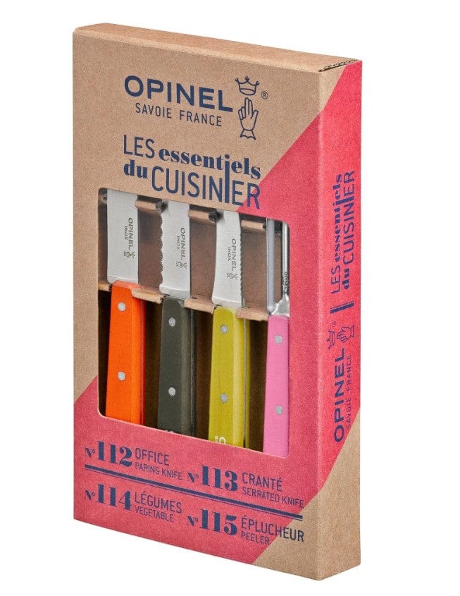 The Shelter Institute Opinel Small Kitchen Essentials set includes four boxed knives with colorful handles—orange, green, yellow, and red. Packaging reads Les essentiels du cuisinier and lists these versatile kitchen essentials in French.