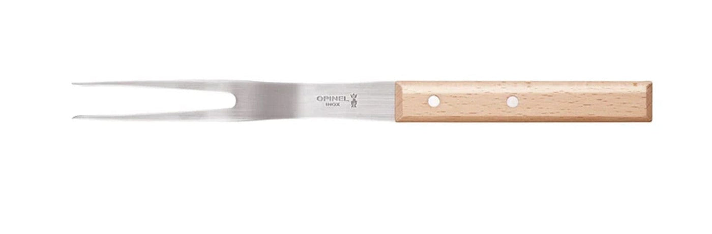 The Opinel Parallele Knife Collection features a stainless steel carving fork with two prongs and a light wooden handle with metal rivets—ideal for use alongside your favorite chefs knife.