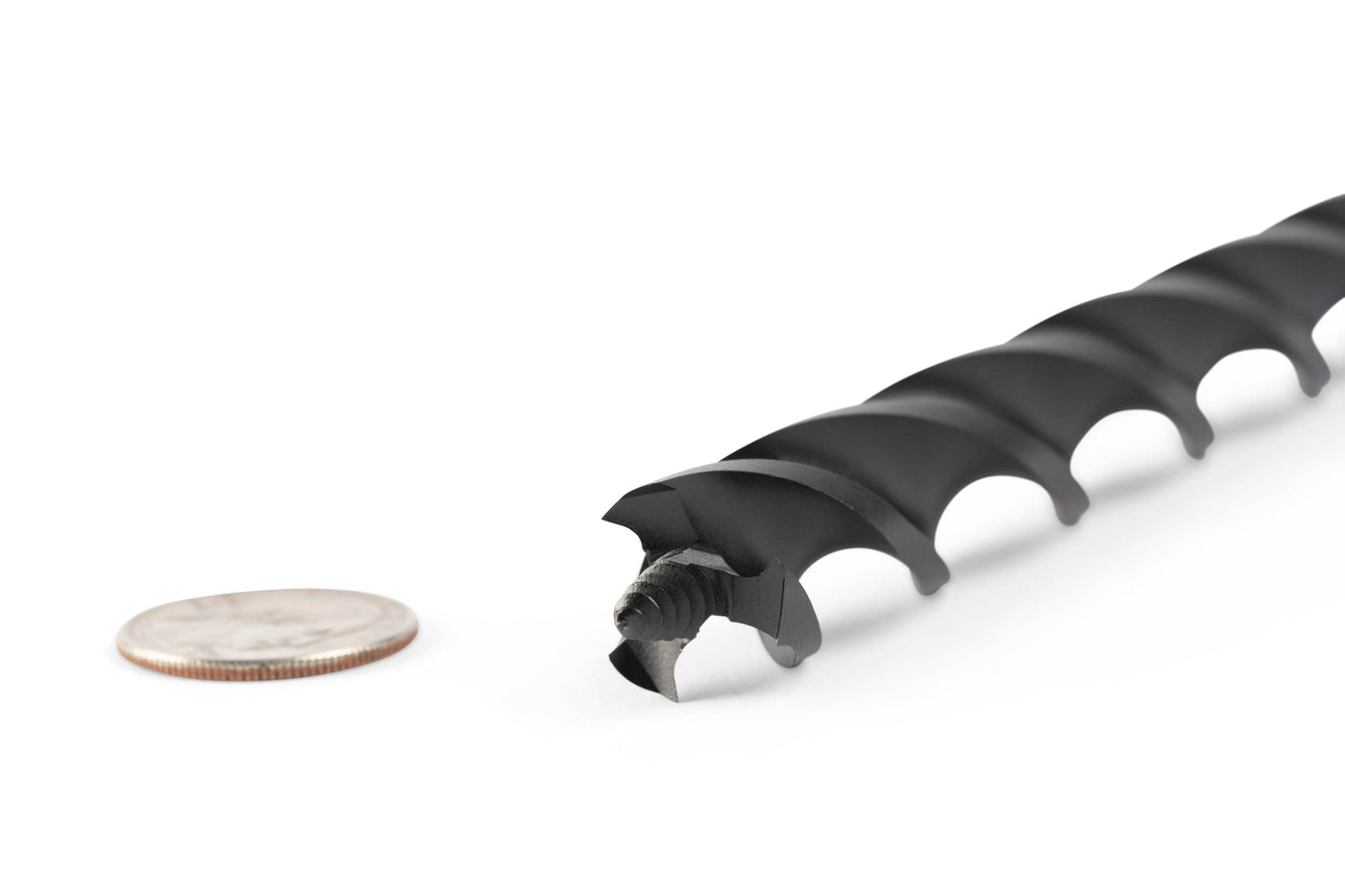 A close-up of the OWL Wood Owl Ultra Smooth Tri-Cut Auger Bit 18-in with efficient chip ejection is shown next to a quarter for size comparison against a white background.