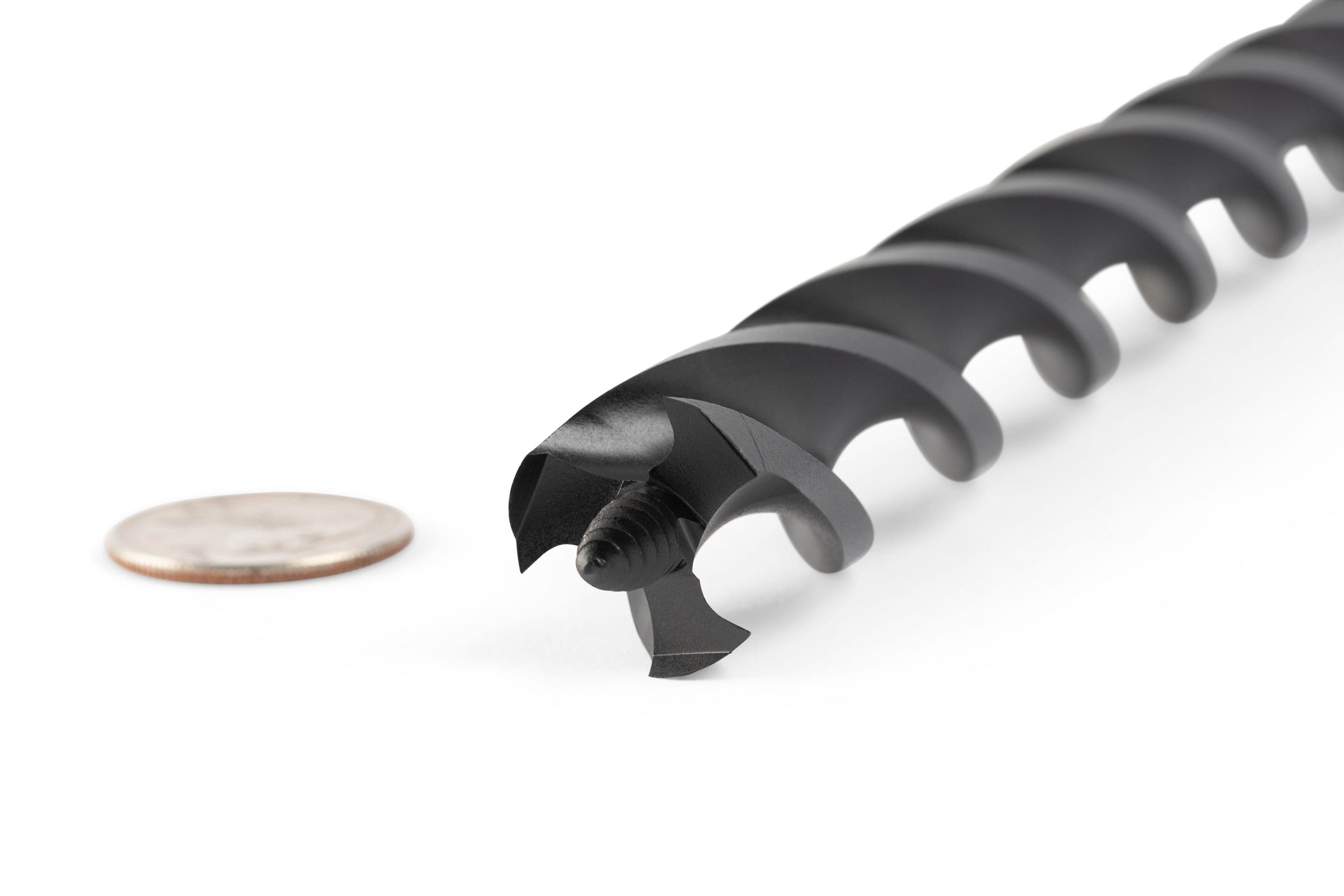 Close-up of an OWL Wood Owl Ultra Smooth Tri-Cut Auger Bit 18-in, made from high-carbon steel, next to a U.S. quarter on a white background, highlighting its tip detail, efficient chip ejection, and size.