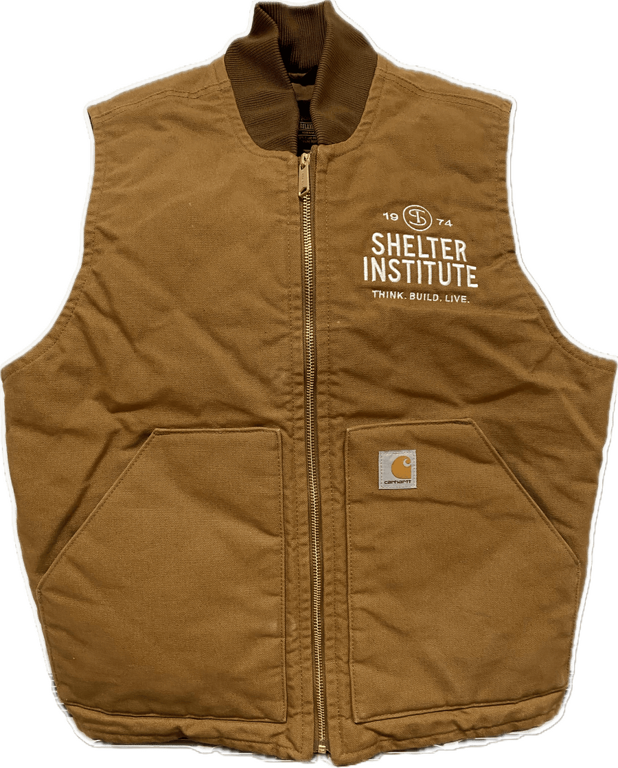 The Carhartt Men's V01 Vest from Shelter Institute features two front pockets, a zipper, and the Shelter Logo printed on the left chest; this insulated duck vest delivers warmth and durability.
