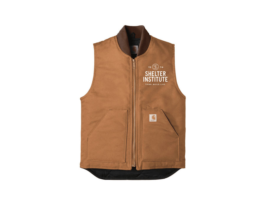 The Shelter Institute Carhartt Duck Vest in brown features two large front pockets, a zipper, and the Shelter Institute logo with “Think. Build. Live.” printed in white on the left chest.
