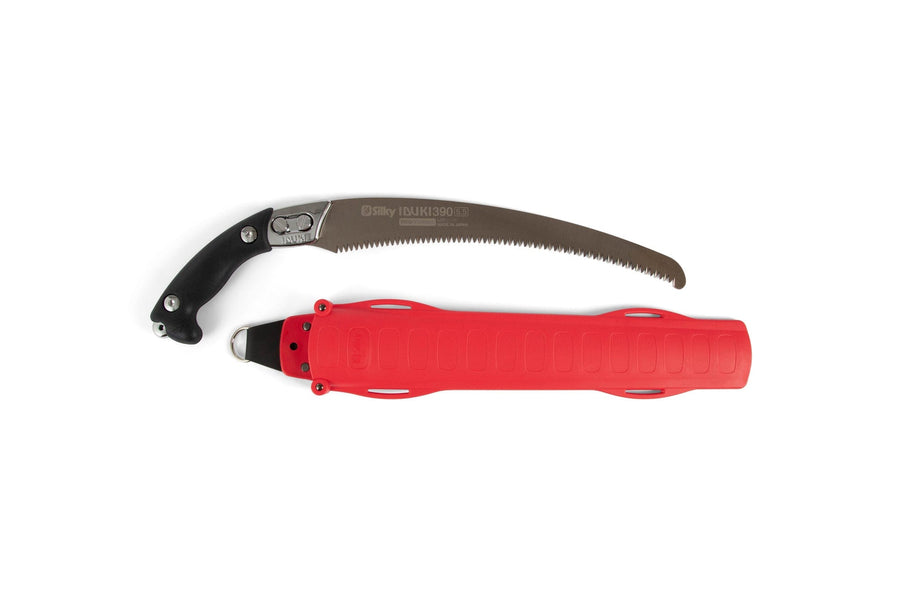 The SHT Silky IBUKI 390mm is a curved Japanese pruning saw with a black handle and silver blade, shown beside its bright red plastic sheath for secure storage.