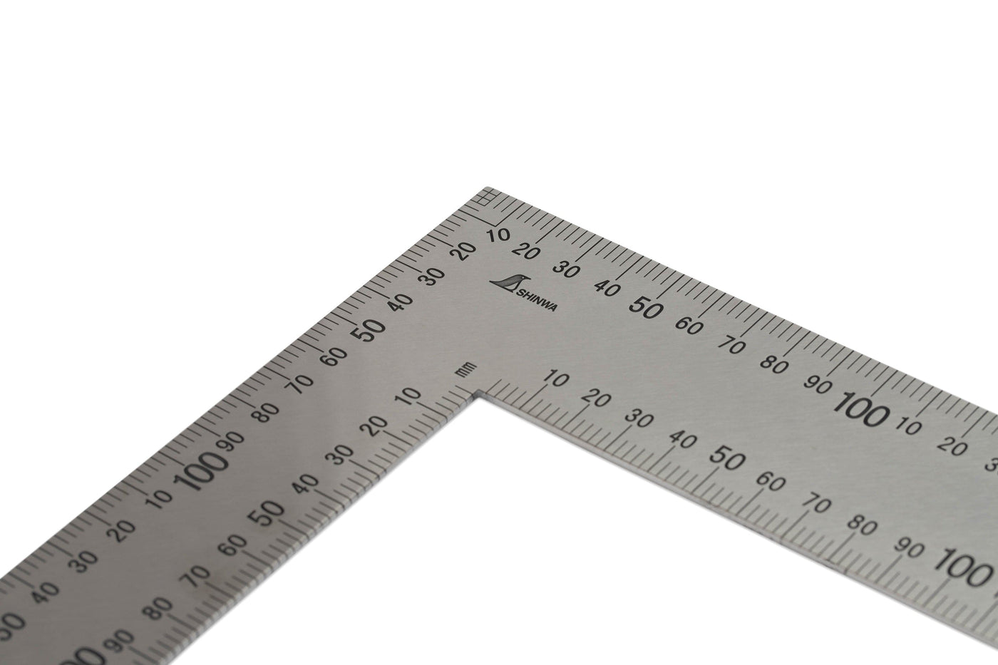 The SHWA Shinwa Japanese Framing Square is a stainless steel carpenters tool with metric measurements (cm/mm), designed for precise right angles—shown here on a white background.