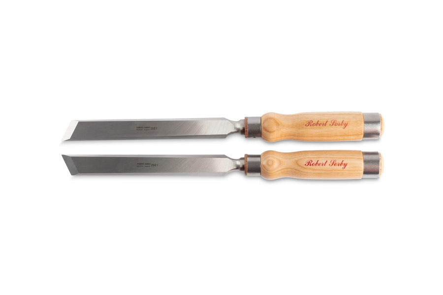 The SOR Robert Sorby Skew Chisel Set includes two wood chisels with wooden handles, ideal for precise joinery. The sharp steel blades are paired with red, engraved Robert Sorby handles.