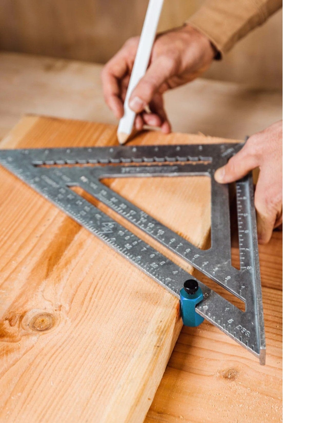 A person uses the Squi.Jig Framing Stair Guage by Squi.Jig with a pencil to mark measurements on a wooden board, ensuring precise rafter layout or construction work.