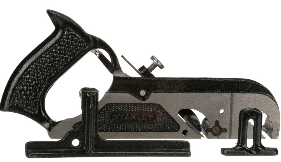 The STN 10 in Bullnose Rabbet Plane features a black and silver cast-iron body, textured handle, adjustment knobs, and an adjustable fence—perfect for precision woodworking tasks.