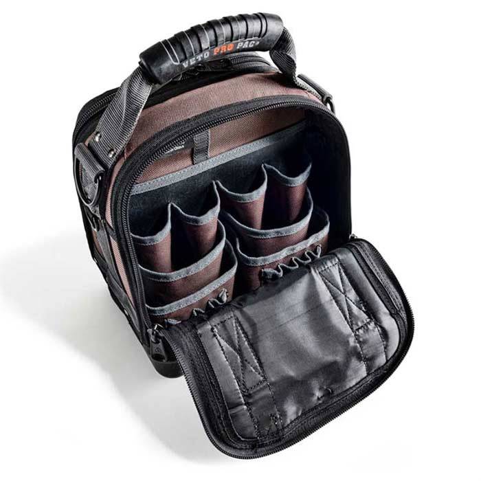 The VET CLOSED TOP TOOL BAG-MC is a black and brown tool bag with a sturdy handle, multiple interior pockets, and compartments, expertly designed for organizing and carrying your tools.