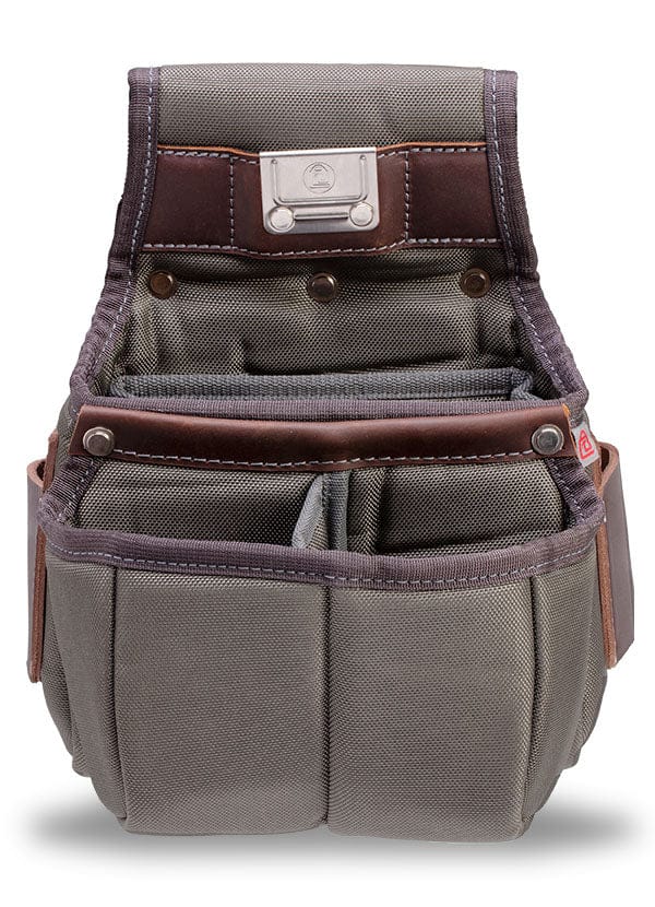 The VET Builder's Belt is a gray fabric tool pouch with multiple compartments and brown leather trim, designed for carrying tools and accessories. Shown upright on a white background, it's ideal to pair with an adjustable tool belt.