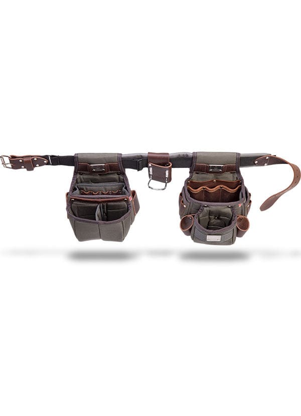 The VET Builder's Belt, made of brown leather and canvas with multiple pouches and pockets for tools and accessories, is shown on a white background.