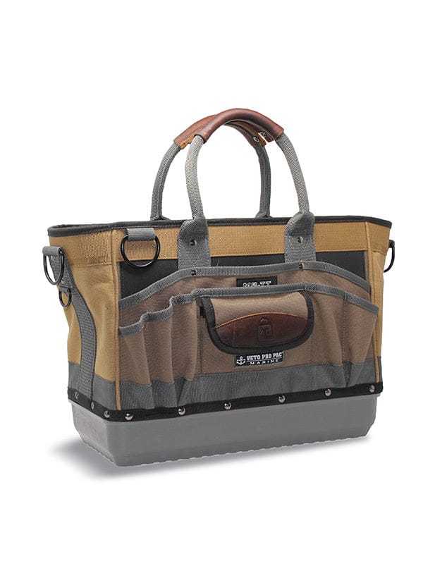 The vet Tool Tote Rubber Base, brown and black with leather handles, features multiple front pockets and a sturdy base for optimal tool storage.