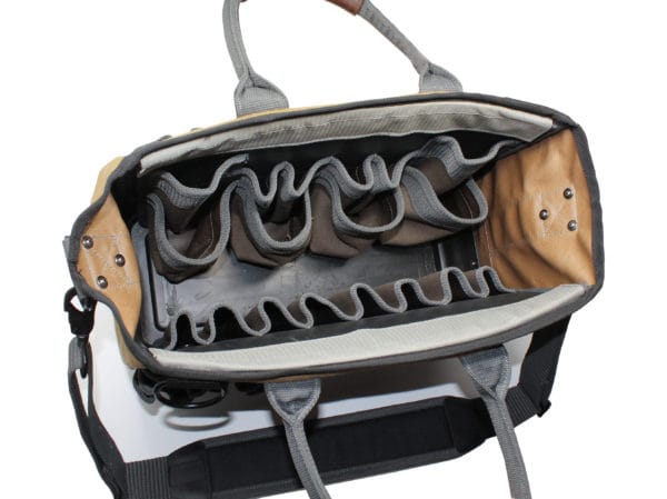 Aerial view showcases the vet Tool Tote Rubber Base in beige and gray, featuring multiple compartments and interior pockets. Includes a handle and shoulder strap for easy carrying.