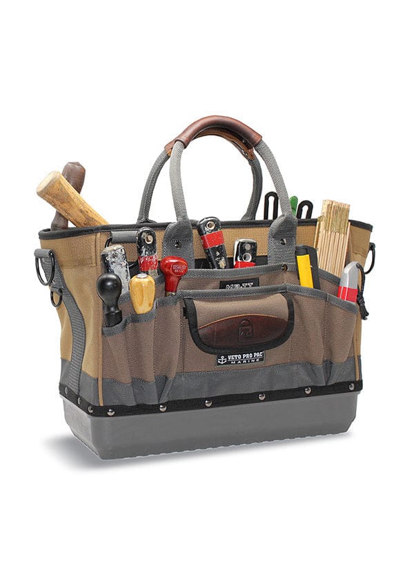 The vet Tool Tote Rubber Base is a brown and gray open tote featuring multiple compartments and interior pockets to hold a variety of tools such as a hammer, flashlight, and tape measure.