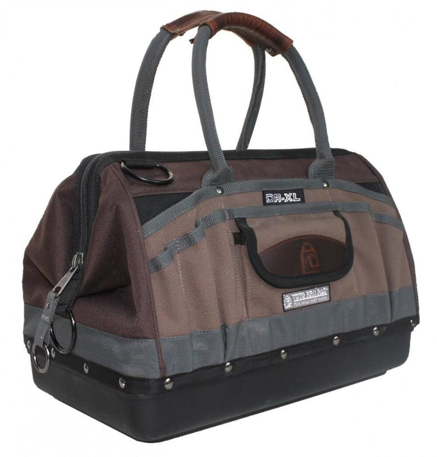 The VET Veto Pro Pack Tool Bag is a durable brown and gray PVC nylon bag with black handles, a reinforced waterproof base, multiple exterior and vertical tool pockets, plus metal rings for extra strength.