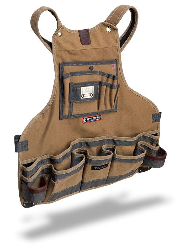 The Veto Tool Apron by VET, showcased against a white background, is a tan apron made from durable polyester canvas. It includes multiple pockets and pouches for optimal tool storage and organization, featuring handy chest pockets.