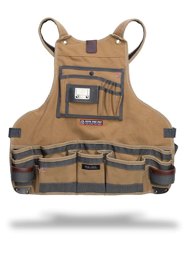 The Veto Tool Apron by VET, made from durable polyester canvas, showcases multiple chest pockets and a sophisticated brown and gray design, all set against a white background.